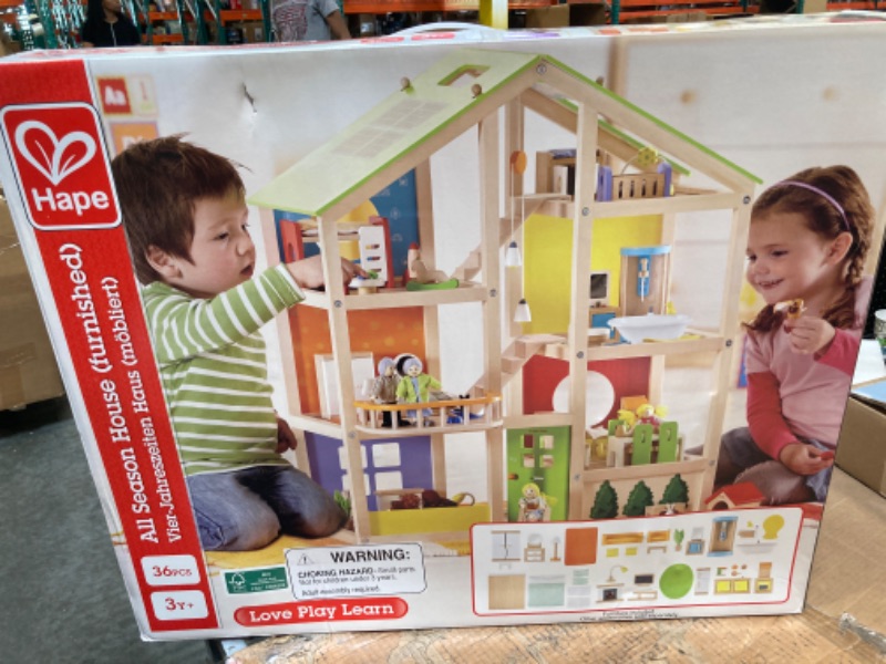 Photo 1 of All Seasons Kids Wooden Dollhouse by Hape | Award Winning 3 Story Dolls House Toy with Furniture, Accessories, Movable Stairs and Reversible Season Theme L: 23.6, W: 11.8, H: 28.9 inch Classic