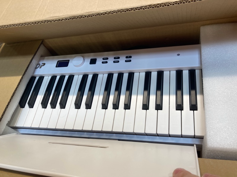 Photo 4 of Veetop 88 Key Keyboard Piano Folding Piano with Full Size, Electric Piano Wood Grain Touch Sensitive Keyboard with Bluetooth MIDI Portable Digital Piano for Beginners and Travel (White)
