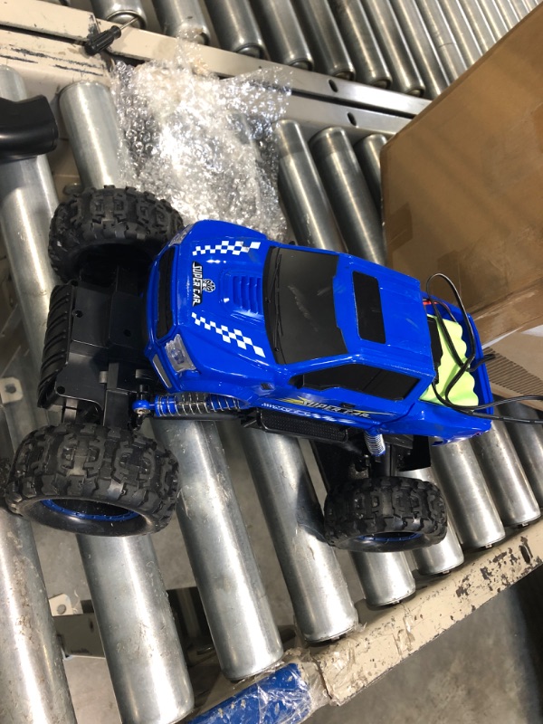 Photo 3 of DOUBLE E RC Cars Remote Control Car 1:12 Off Road Monster Truck for Boy Adult Gifts,2.4Ghz All Terrain Hobby Car,4WD Dual Motors LED Headlight Rock Crawler Blue Large