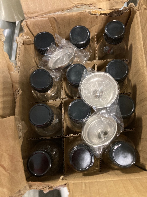 Photo 1 of 12, 2 oz Small Clear Glass Bottles (60ml) with Lids & 3 Stainless Steel Funnels - Boston Round Sample Bottles for Potion, Juice, Ginger Shots, Oils, Whiskey, Liquids - Mini Travel Bottles, NO Leakage