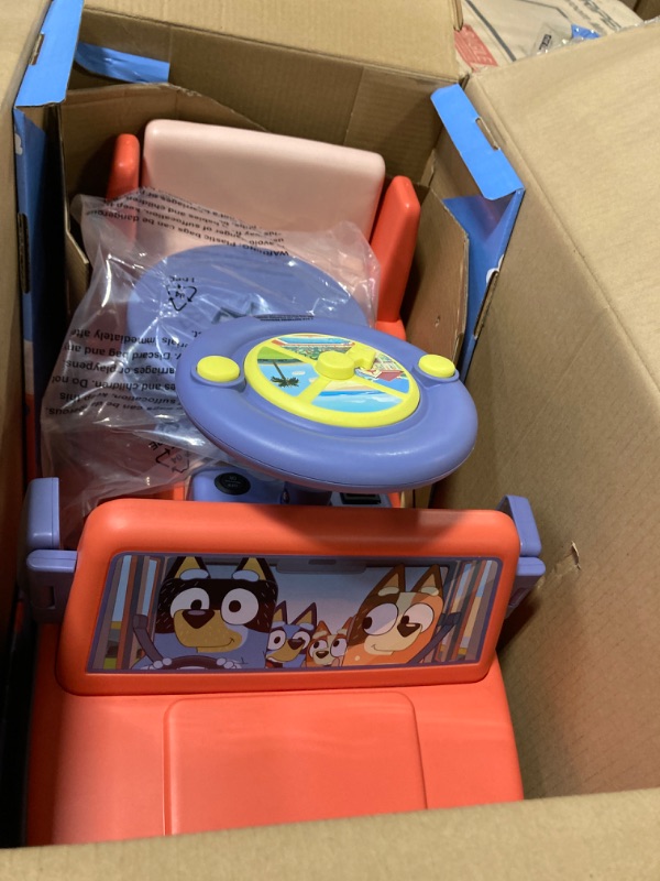Photo 1 of Bluey 6V Ride On Car for Toddlers - Interactive Electric Car for Kids with Sound Effects & Music, Riding Toy for Boys & Girls, Includes 6V Rechargeable Battery & Charger