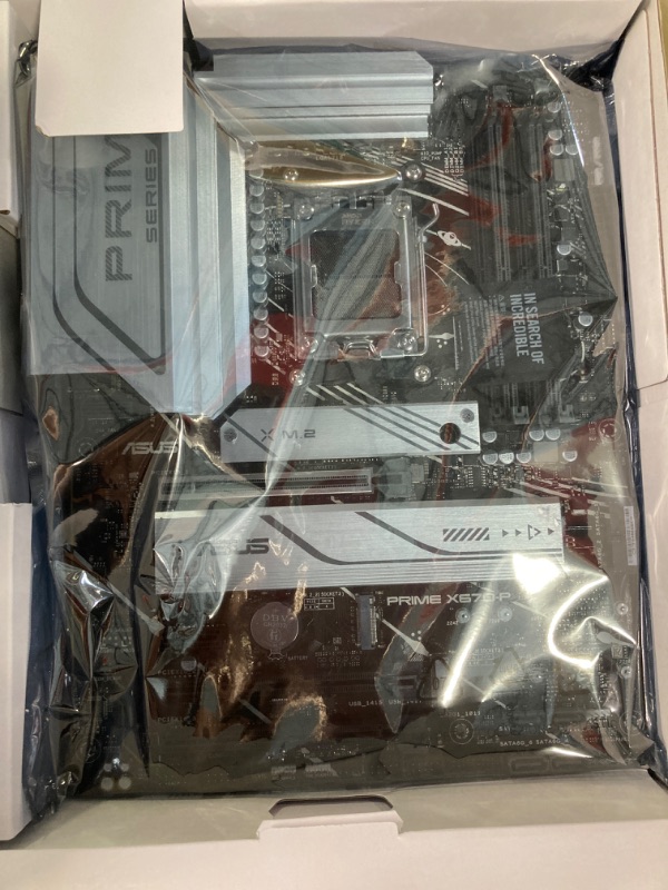 Photo 3 of **FOR PARTS**ASUS Prime X670-P Socket AM5 (LGA 1718) Ryzen 7000 ATX Motherboard(DDR5, 3xM.2 Slots, USB 3.2 Gen 2x2 Type-C®, USB4® Header, and 2.5Gb Ethernet)