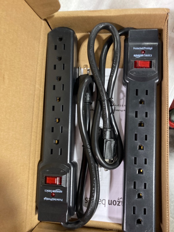 Photo 2 of Amazon Basics 6-Outlet, 200 Joule Surge Protector Power Strip, 2 Foot, Black - Pack of 2 Black Strip