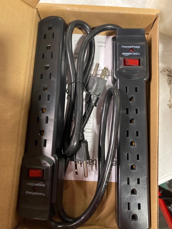 Photo 2 of Amazon Basics 6-Outlet, 200 Joule Surge Protector Power Strip, 2 Foot, Black - Pack of 2 Black Strip