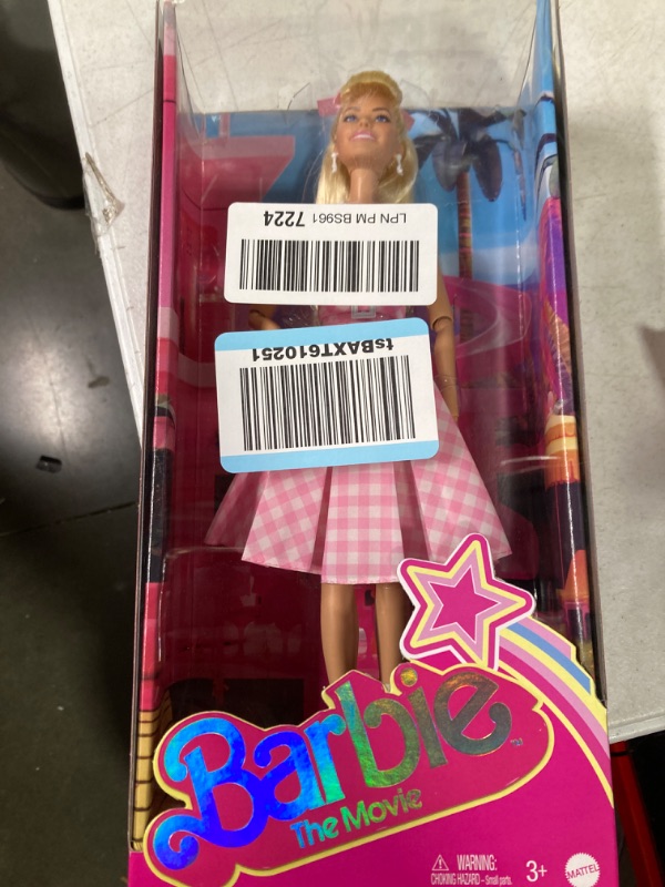 Photo 1 of Barbie The Movie Doll, Margot Robbie as Barbie, Collectible Doll Wearing Pink and White Gingham Dress with Daisy Chain Necklace
