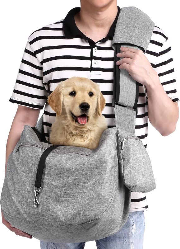 Photo 1 of ** SIMILAR TO THE STOCK PHOTO** Ownpets Pet Sling Carrier, Fits 15 to 25lbs Extra-Large Dog/Cat Sling Carrier Reversible and Hands-Free Dog Bag with Adjustable Strap and Pocket Shoulder Pad for Outdoor Travel Hiking