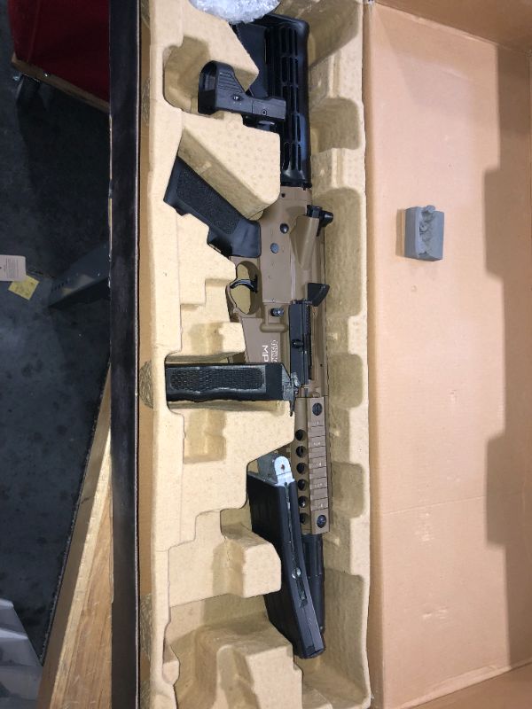 Photo 1 of Bushmaster BMPWX Full Auto MPW CO2-Powered BB Air Rifle With Dual Action Capability And Red Dot Sight, Black/FDE
