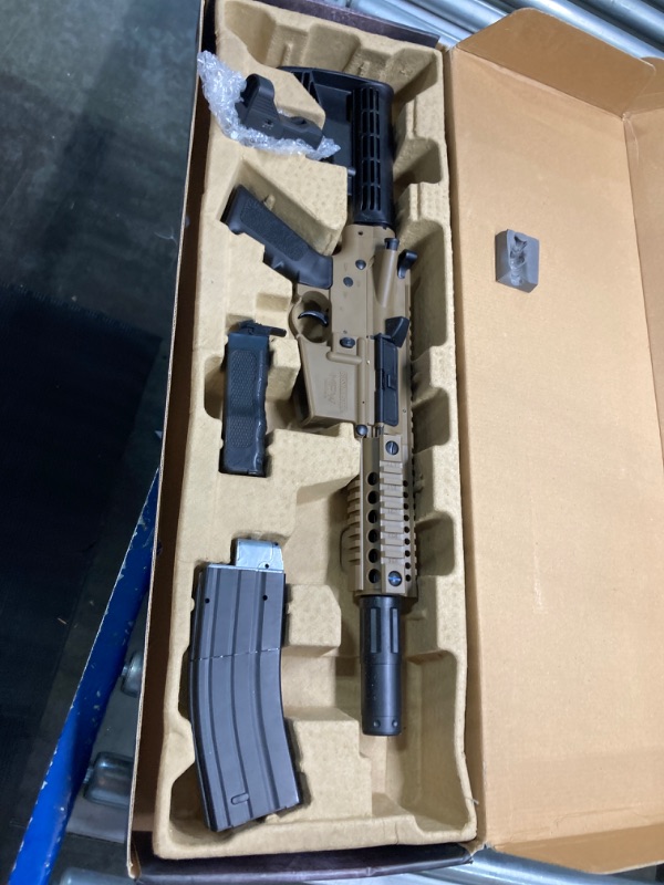 Photo 1 of Bushmaster BMPWX Full Auto MPW CO2-Powered BB Air Rifle With Dual Action Capability And Red Dot Sight, Black/FDE