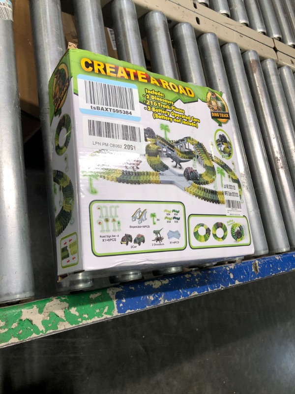 Photo 1 of Dinosaur Toys,Create A Dinosaur World Road Race,Flexible Track Playset and 2 pcs Cool Dinosaur car for 3 4 5 6 Year & Up Old boy Girls Best Gift Green