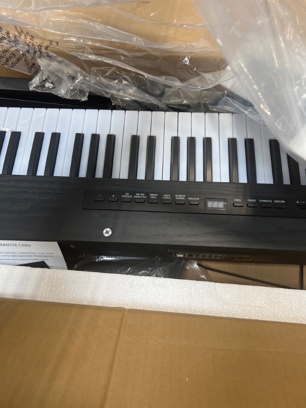 Photo 4 of MSTNE Digital Piano 88 Key Semi Weighted Keyboard?Piano Keyboard 88 Key for Beginners with Lighted Up Keys?Portable Electric Piano with Adjustable Stand?Carrying Case?Sustain Pedal?Headphone?Black