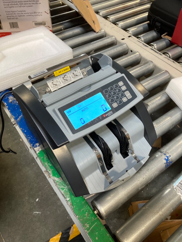 Photo 3 of Cassida 5520 UV - USA Money Counter with ValuCount, UV/IR Counterfeit Detection, Add and Batch Modes - Large LCD Display & Fast Counting Speed 1,300 Notes/Minute UV Counterfeit Detection Detection
***New, factory packaging still intact*** 