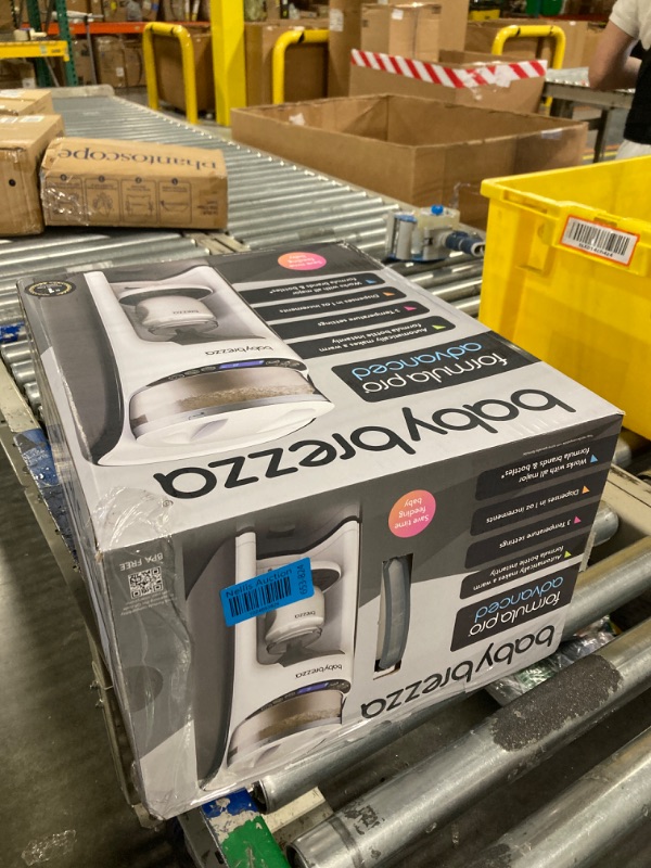 Photo 1 of Baby Brezza New and Improved Formula Pro Advanced Formula Dispenser Machine - Automatically Mix a Warm Formula Bottle Instantly - Easily Make Bottle with Automatic Powder Blending, White