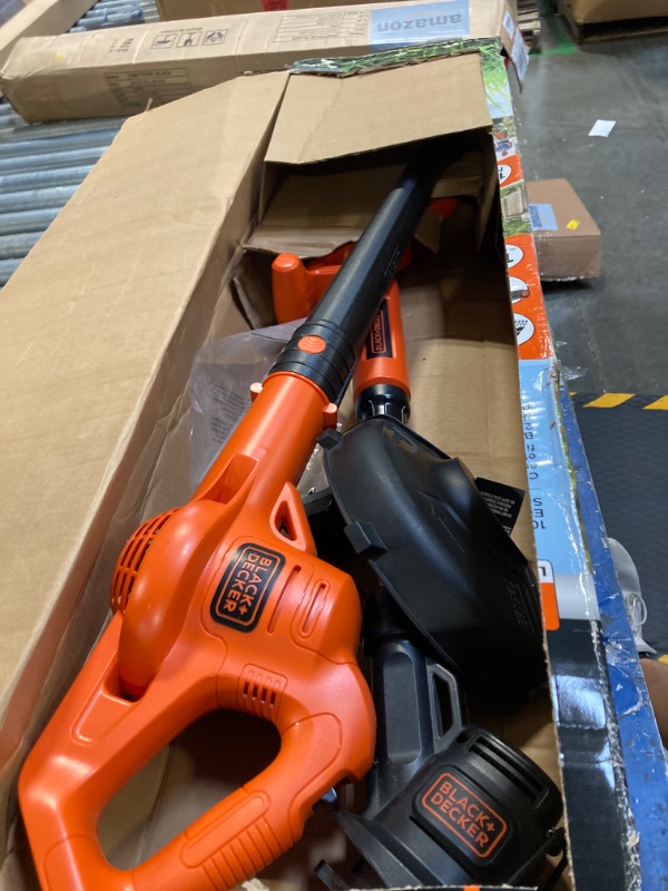 Photo 1 of ***NO BATTERY AND MISSING ACCESSORIES*** 

Black + Decker String Trimmer/Edger, Hard Surface Sweeper
