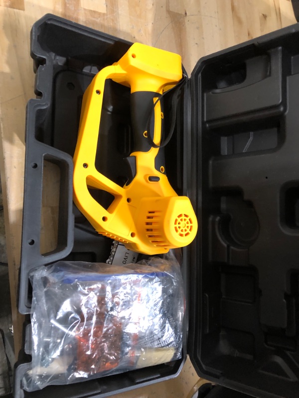 Photo 2 of Cordless Mini Chainsaw for Dewalt 20v Battery, Small Chain Saw with Brushless Motor and Security Lock, LIVOWALNY 4" Handheld Electric Chainsaw for Wood Cutting,Tree Branches (Battery Not Included) 4" Chainsaw