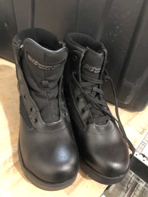 Photo 1 of mens boots size 9.5 one boot missing lace.