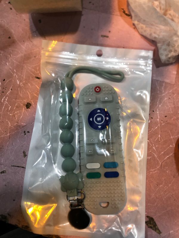 Photo 1 of baby teether toy remote