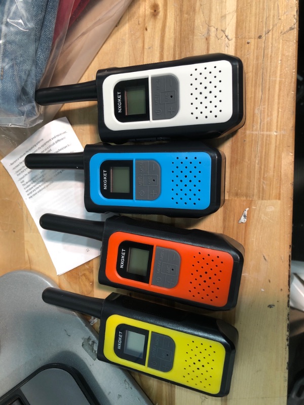 Photo 2 of NXGKET Walkie Talkies for Adults 4 Pack, Rechargeable Long Range Walkie Talkie 2 Way Radios 22 Channels VOX Scan LCD Display with 1200mAh Li-ion Battery USB-C Cable for Gift Family Camping Hiking 4 Pack 1Blue & 1Orange & 1White & 1Yellow & 2Micro USB-C Ca