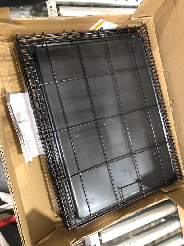 Photo 1 of Amazon Basics Foldable Metal Wire Dog Crate with Tray, Single or Double Door Styles 42" Single Door w/ Divider Crate