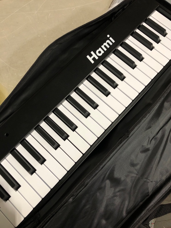 Photo 2 of * see all images *
Hami Piano Keyboard,88 Keys Electric Keyboard Piano Semi-Weighted Digital Piano Foldable Keyboard