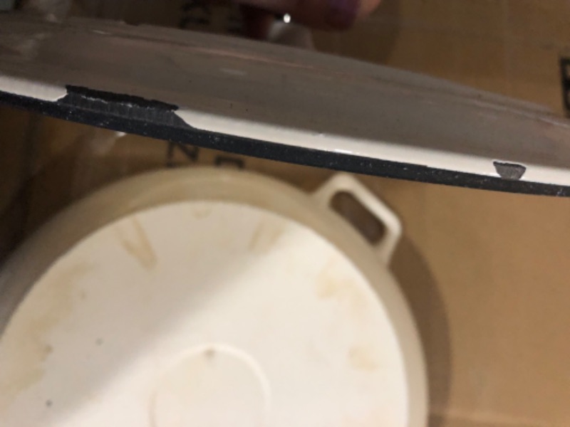 Photo 1 of ***DAMAGED***LID IS CHIPPED ON EDGES *HANDLES ALSO CHIPPED *** 
Amazon Basics Enameled Cast Iron Covered Casserole Skillet - 3.3-Quart, White 3.3-Quart Skillet White