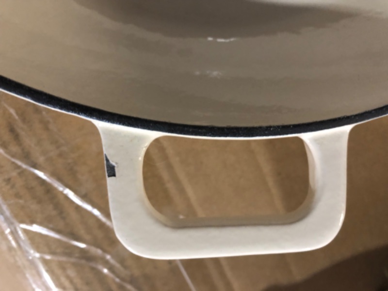 Photo 1 of ***DAMAGED***LID IS CHIPPED ON EDGES *HANDLES ALSO CHIPPED *** 
Amazon Basics Enameled Cast Iron Covered Casserole Skillet - 3.3-Quart, White 3.3-Quart Skillet White