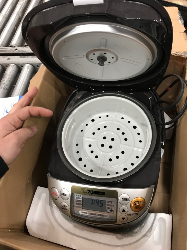 Photo 3 of ***CORD DOESN'T RETRACT - MISSING SPOON BRACKET AND MEASURING CUP***
Zojirushi NS-TSC10 5-1/2-Cup (Uncooked) Micom Rice Cooker and Warmer, 1.0-Liter 5.5 cups Rice Cooker