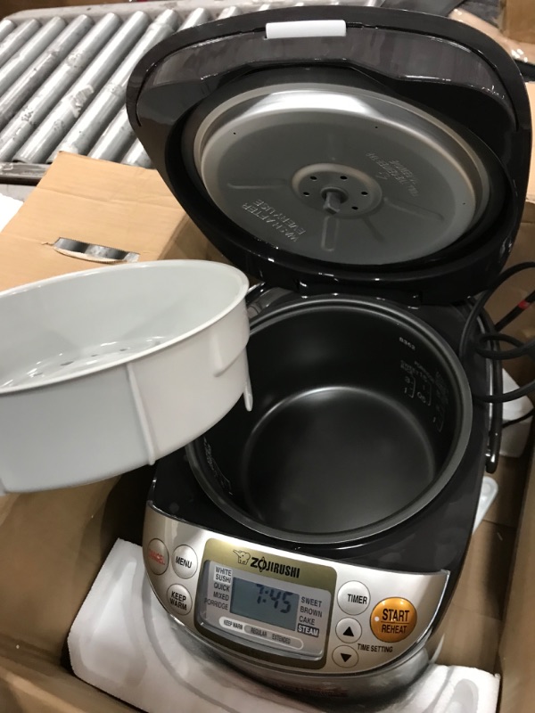 Photo 5 of ***CORD DOESN'T RETRACT - MISSING SPOON BRACKET AND MEASURING CUP***
Zojirushi NS-TSC10 5-1/2-Cup (Uncooked) Micom Rice Cooker and Warmer, 1.0-Liter 5.5 cups Rice Cooker