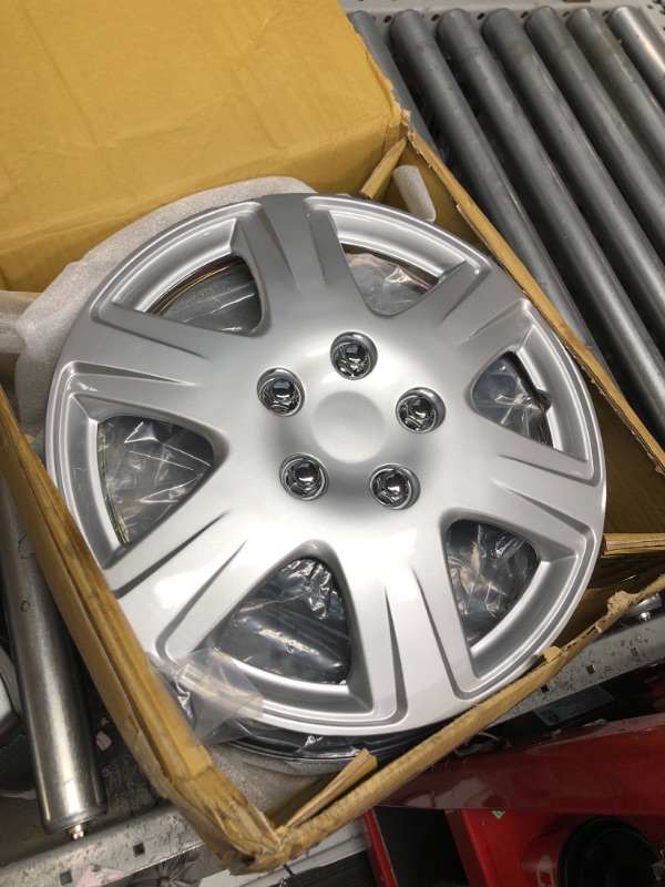 Photo 2 of Four ABS Plastic Silver Colored Hubcaps - 15 Inch Diameter