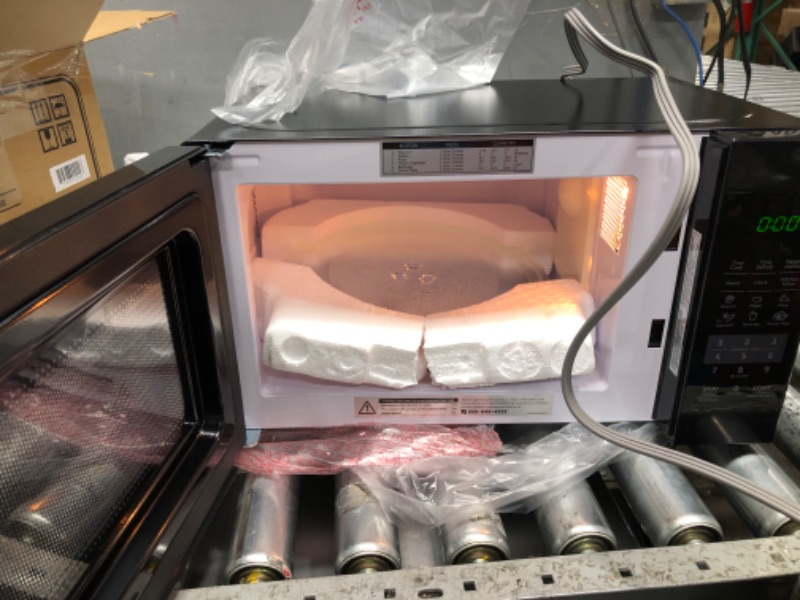 Photo 1 of COMFEE' EM720CPL-PMB Countertop Microwave Oven with Sound On/Off, ECO Mode and Easy One-Touch Buttons, 0.7cu.ft, 700W, Black Black Microwave