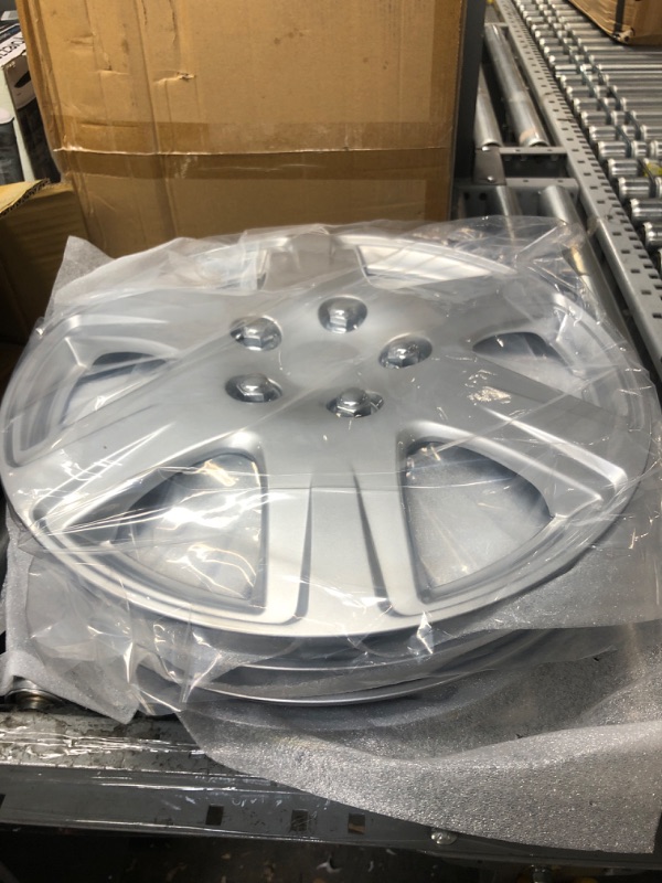 Photo 2 of Four ABS Plastic Silver Colored Hubcaps - 15 Inch Diameter