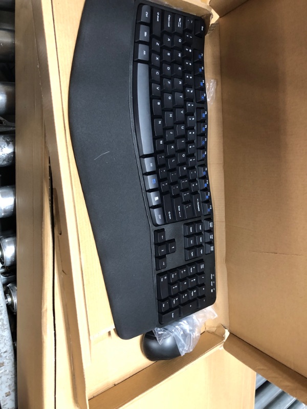 Photo 2 of Amazon Basics Ergonomic Wireless Keyboard Mouse Combo - QWERTY - Black