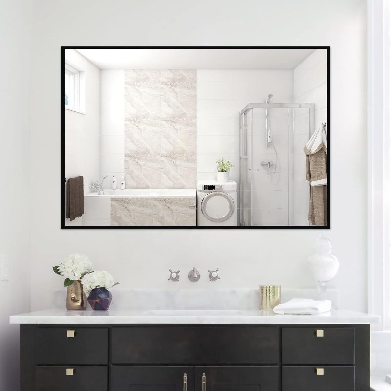 Photo 1 of **NOT EXACT SAME AS STOCK PHOTO** Rectangular mirror with black border. 32x40