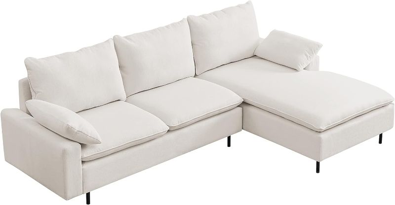 Photo 1 of **NOT EXACT SAME AS STOCK PHOTO. PARTIAL SET** beige L-Shaped sofa with wood legs. 2 Side pillows included