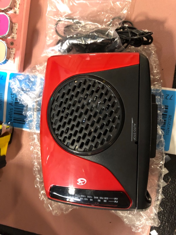 Photo 2 of GPX Portable Cassette Player, 3.54 x 1.57 x 4.72 Inches, Requires 2 AA Batteries - Not Included, Red/Black (CAS337B) Black/Red