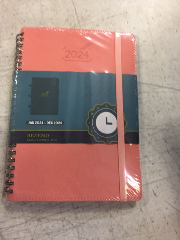 Photo 2 of 2024 Planner by BEZEND, A5 Calendar 5.8" x 8.5", Daily Weekly and Monthly Agenda,Spiral Bound,FSC Certified 100GSM Paper, Vegan Leather Soft Cover - Pink Pink 12 Months 5.8" x 8.5"