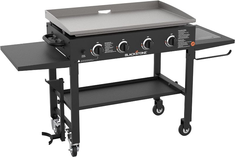 Photo 1 of Blackstone 36" Cooking Station 4 Burner Propane Fuelled Restaurant Grade Professional 36 Inch Outdoor Flat Top Gas Griddle with Built in Cutting Board, Garbage Holder and Side Shelf (1825), Black

