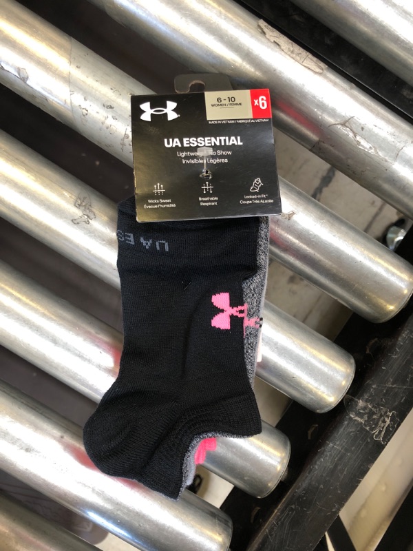 Photo 1 of Under Armor Socks, 6 pairs (1 sock missing). 