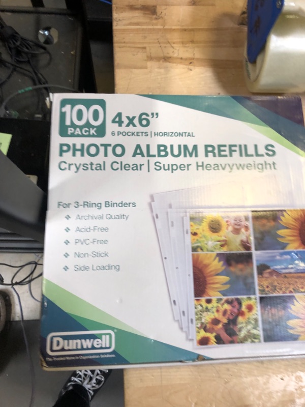 Photo 2 of Dunwell Photo Album Refill Pages 12x12 - (4x6 Landscape, 100 Pack) Holds 1200 4x6" Photos, 4x6 Photo Sleeves for 3 Ring Binder, D-Ring Scrapbook Album 12x12,Archival Quality Page Protectors 12x12 4x6" Landscape 100 Pack