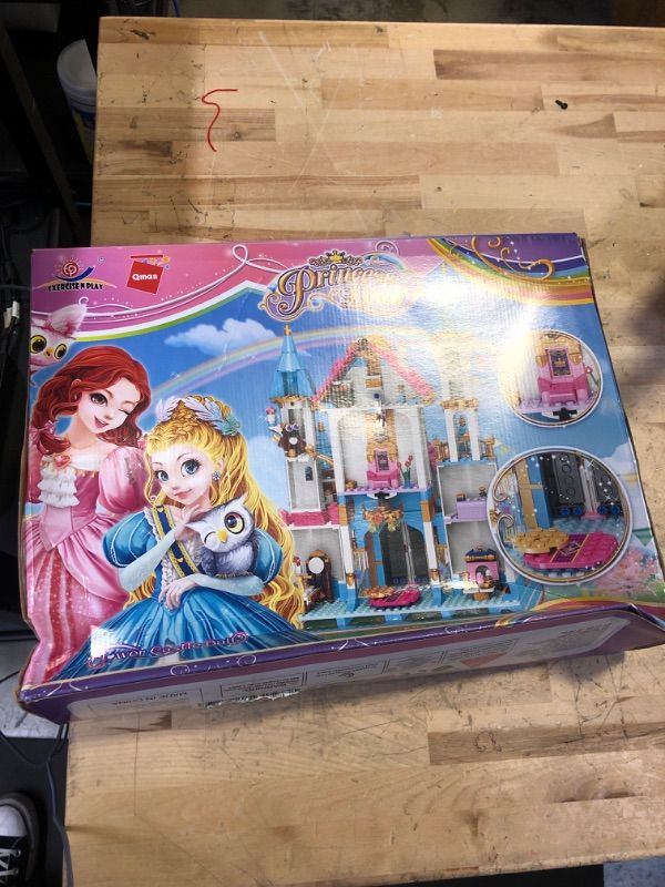 Photo 2 of Girls Princess Castle Building Kit, 1117 Pieces Dream Castle Building Blocks Sets for Girls Age 6-12, Creative Roleplay Christmas Birthday Gifts for Kids Girls 6 7 8 9 10 11 12 Years
