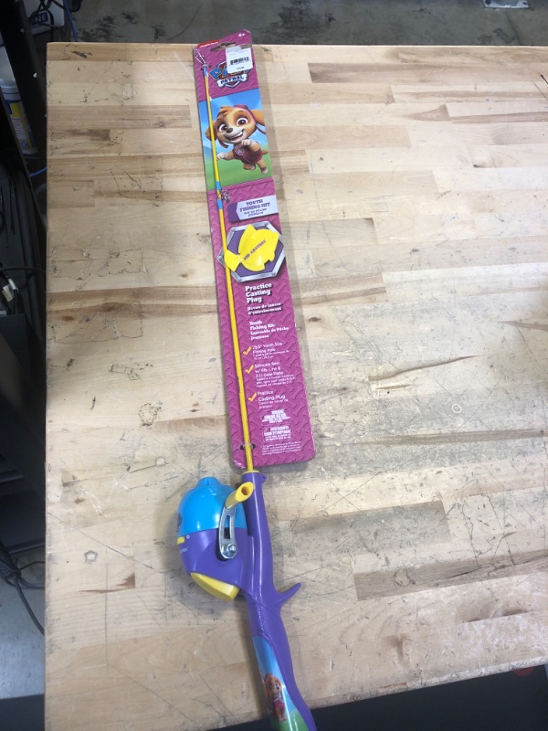 Photo 2 of Kid Casters: Youth 29.5" Fishing Poles | Small & Easy to Use | Spincast Reel w/ 3:1:1 Gear Ratio | (Pre-spooled w/ 6-Pound line, Incl. Casting Plug) Paw Patrol Girls