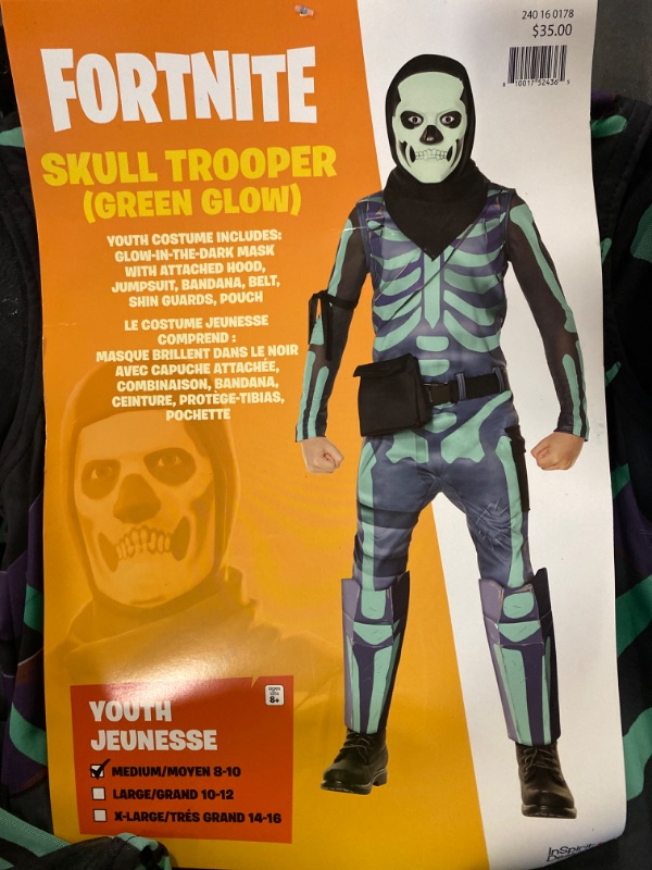 Photo 2 of InSpirit Designs Licensed Fortnite Green Skull Trooper with Glow In The Dark Mask, Youth Costume Medium
