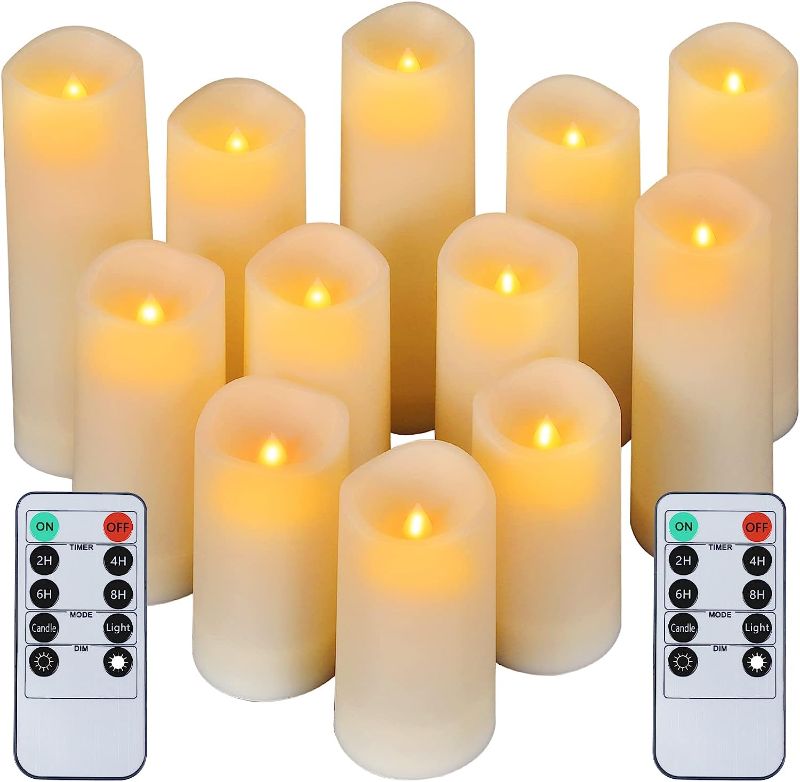 Photo 1 of crowm Flickering Flameless Candles with Remote, Battery Operated Timer LED Votive Candles, Outdoor Waterproof Pillar Ivory Candles Light for Christmas Halloween Decor - Set of 12