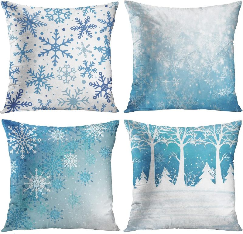 Photo 1 of Emvency Set of 4 Throw Pillow Covers 18x18 Inches Decorative Cushion Merry Christmas Blue Snow Winter with Snowflakes Falling White Crystal Forest Pillow Cases Square Pillocases for Bed Sofa