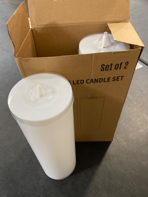 Photo 2 of Large Flameless LED Candles Outdoor: 12" x 4" Battery Operated Pillar Candles Flickering with Timer Waterproof Fake Electric Candles with Remote for Patio Porch Lanterns (White Set of 2)