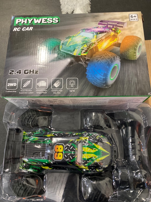 Photo 1 of PHYWESS Remote Control Car, RC Cars Toys for Boys 5-7, Off Road Kids Toys for Girls, 2.4Ghz 20 KM/H Monster Truck Toys Cars Gifts for 6 Year Old Girl, RC Truck with Car Body Lights & Headlights