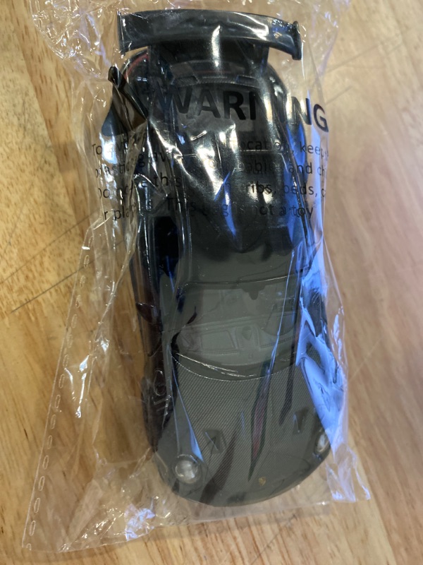 Photo 2 of Kinsmart 2010 Porsche 911 GT2 RS Triple Black 1/36 Scale Diecast Metal Model Toy Sports Car
