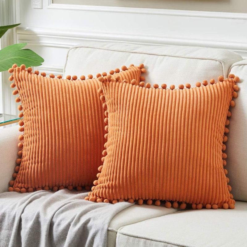Photo 1 of Fancy Homi Pack of 2 Corduroy Fall Decorative Throw Pillow Covers with Pom-poms, Solid Square Cushion Case Pillow Cases Set for Couch Sofa Bedroom Car Living Room (18x18 Inch/45x45 cm, Orange)