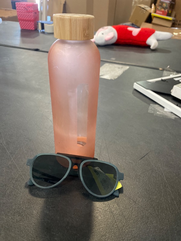 Photo 1 of Sunglasses and water bottle combo 