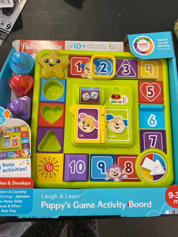 Photo 2 of Fisher-Price Laugh & Learn Puppy’s Game Activity Board Baby & Toddler Learning Toy
