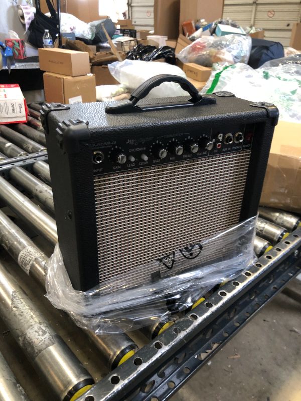 Photo 2 of Leo Jaymz 20W Electric Guitar Amplifier - Clean and Distortion Channel - 3 Band Equalization and CD Line Input - Recording Studio, Practice Room, Small Courtyard (6.5" Black) 6.5"Black